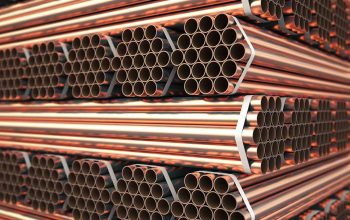 Copper or bronze metal pipes in warehouse. Heavy non-ferrous metallurgical industry. 3d illustration